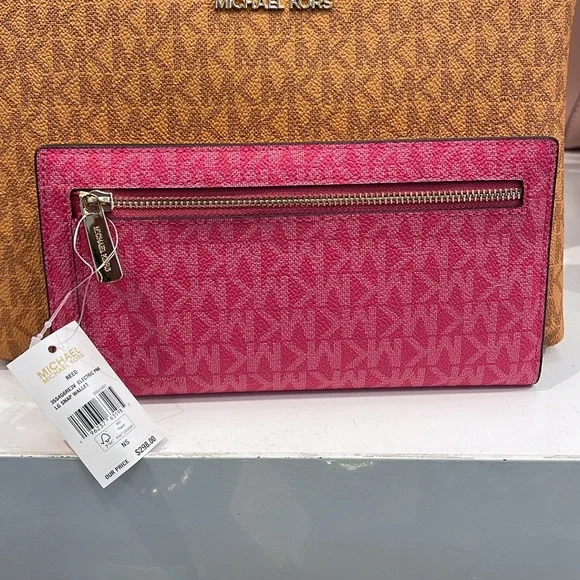 MICHAEL KORS
Reed Large Snap Signature Wallet
Electric Pink NWT - Picture 10 of 16